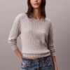 Maglione in cotone a trecce Maglione in cotone a trecce