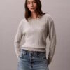 Maglione in cotone a trecce Maglione in cotone a trecce