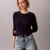Maglione in cotone a trecce Maglione in cotone a trecce