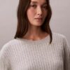 Maglione in cotone a trecce Maglione in cotone a trecce