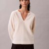Maglione morbido in lana merino con scollo a V Maglione morbido in lana merino con scollo a V