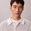 Maglione polo in cotone a trama waffle Maglione polo in cotone a trama waffle