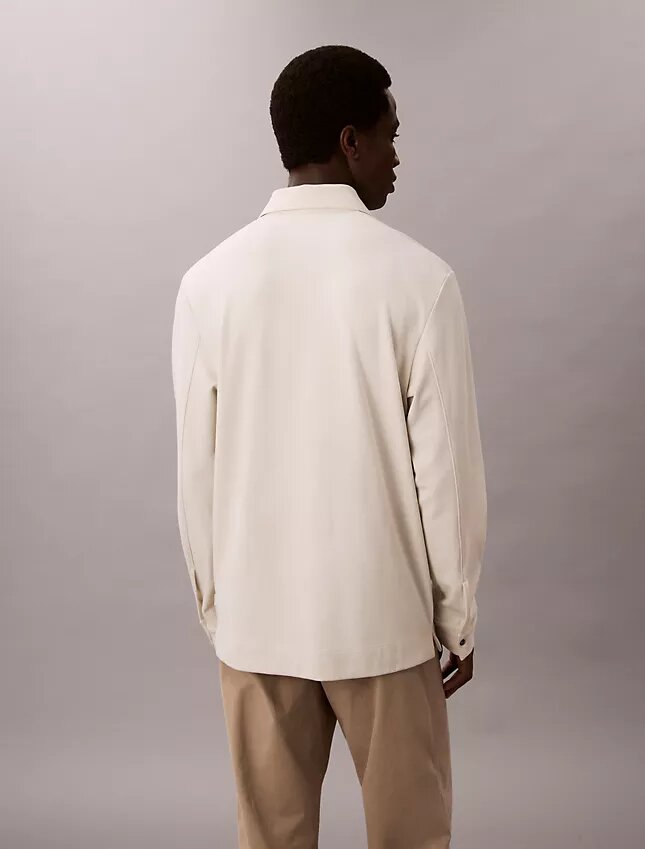 Maglione polo jacquard dal taglio morbido Maglione polo jacquard dal taglio morbido