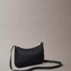 Mini borsa con Monogram audace