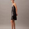 Miniabito con paillettes Miniabito con paillettes