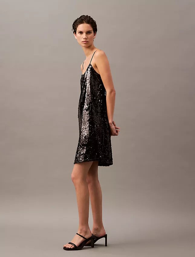 Miniabito con paillettes Miniabito con paillettes
