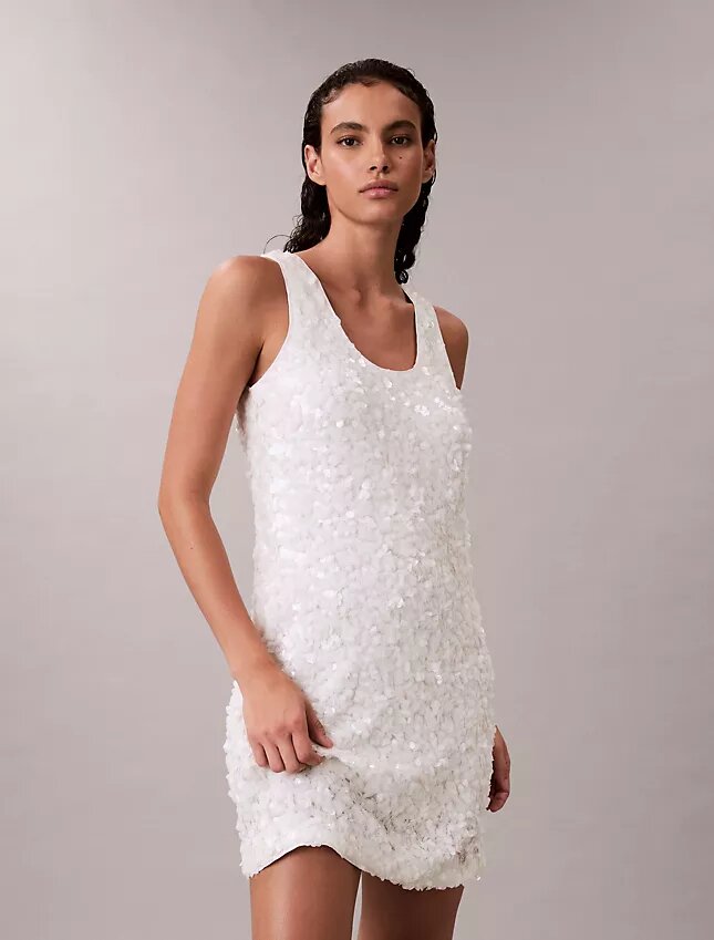 Miniabito con paillettes Miniabito con paillettes