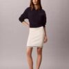 Minigonna in maglia a micro trecce Minigonna in maglia a micro trecce