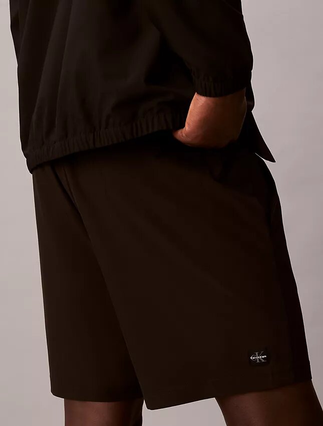 Pantaloncini con monogramma intrecciato Pantaloncini con monogramma intrecciato