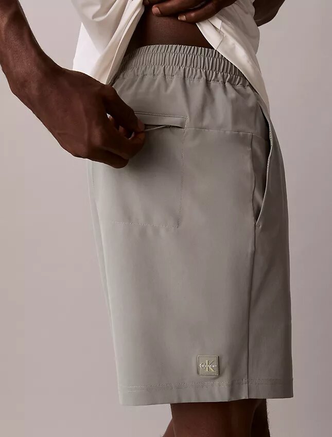 Pantaloncini con monogramma intrecciato Pantaloncini con monogramma intrecciato