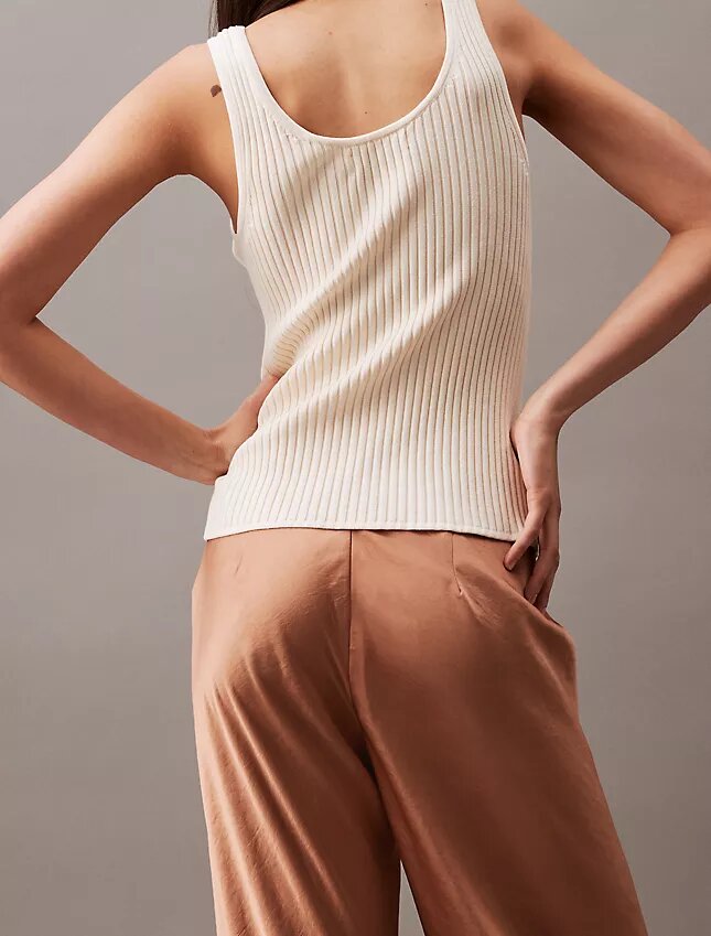 Pantaloni a gamba larga in raso stropicciato Pantaloni a gamba larga in raso stropicciato