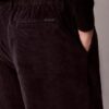 Pantaloni a gamba larga in velluto a coste con pieghe Pantaloni a gamba larga in velluto a coste con pieghe