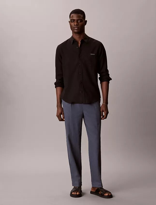 Pantaloni a pieghe in misto lino Pantaloni a pieghe in misto lino