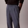 Pantaloni a pieghe in misto lino Pantaloni a pieghe in misto lino
