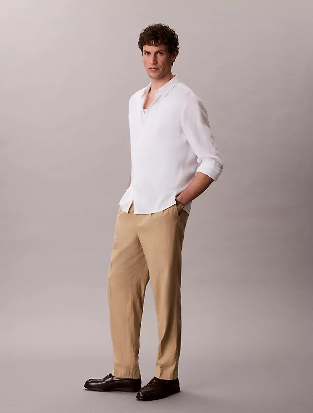 Pantaloni a pieghe in misto lino Pantaloni a pieghe in misto lino