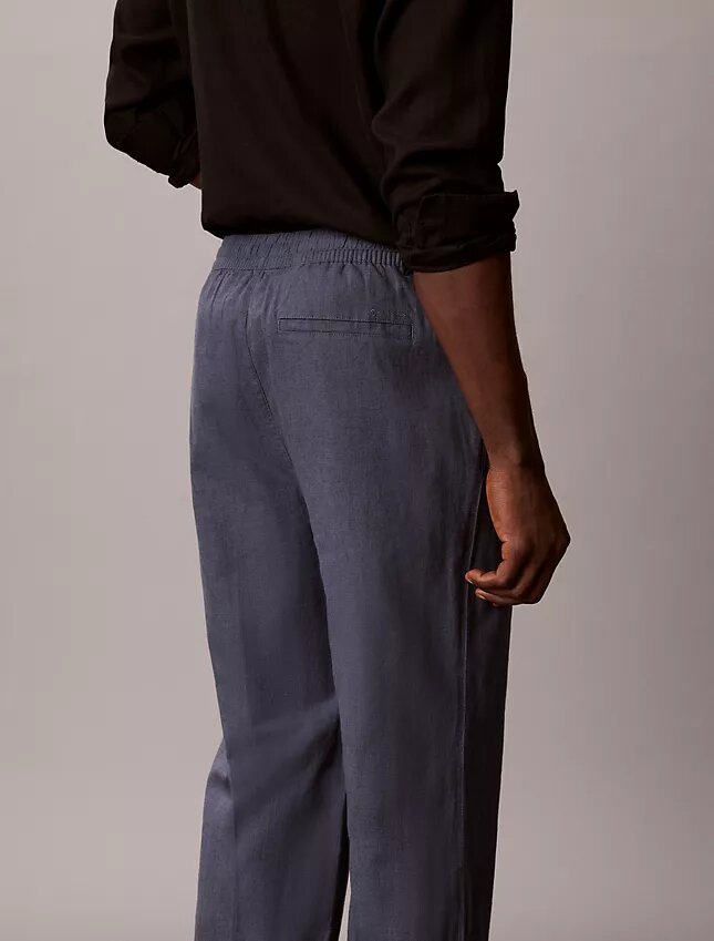Pantaloni a pieghe in misto lino Pantaloni a pieghe in misto lino