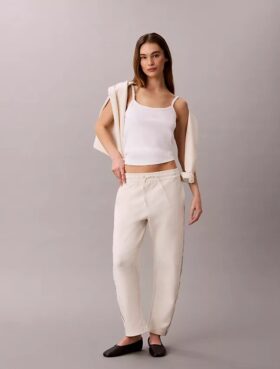 Pantaloni a zampa con nastro con logo