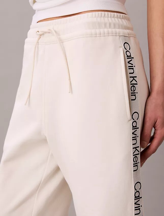 Pantaloni a zampa con nastro con logo Pantaloni a zampa con nastro con logo