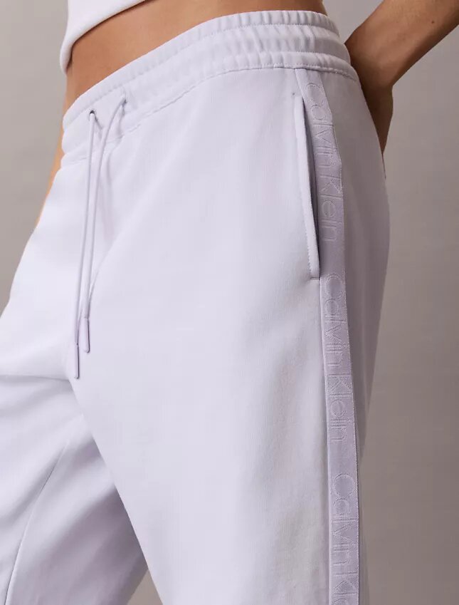 Pantaloni a zampa con nastro con logo Pantaloni a zampa con nastro con logo