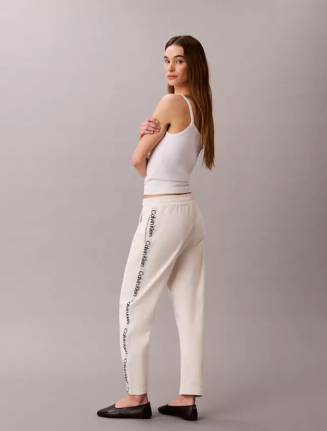 Pantaloni a zampa con nastro con logo Pantaloni a zampa con nastro con logo