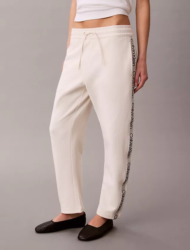 Pantaloni a zampa con nastro con logo Pantaloni a zampa con nastro con logo