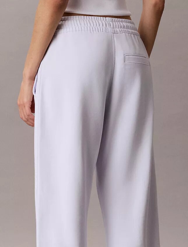 Pantaloni a zampa con nastro con logo Pantaloni a zampa con nastro con logo