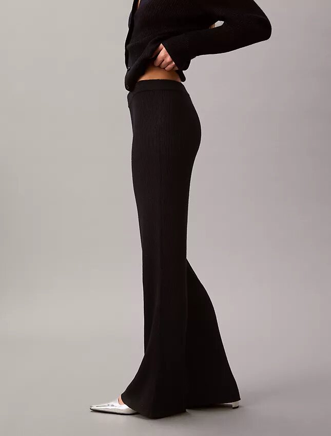 Pantaloni a zampa in misto lana merino e lurex Pantaloni a zampa in misto lana merino e lurex