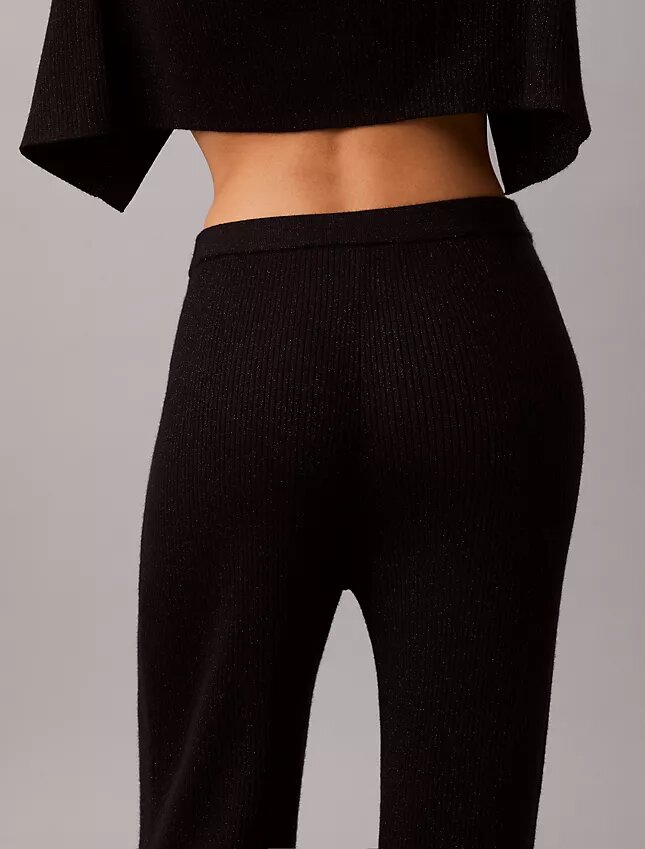 Pantaloni a zampa in misto lana merino e lurex Pantaloni a zampa in misto lana merino e lurex