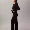 Pantaloni a zampa in misto lana merino e lurex Pantaloni a zampa in misto lana merino e lurex