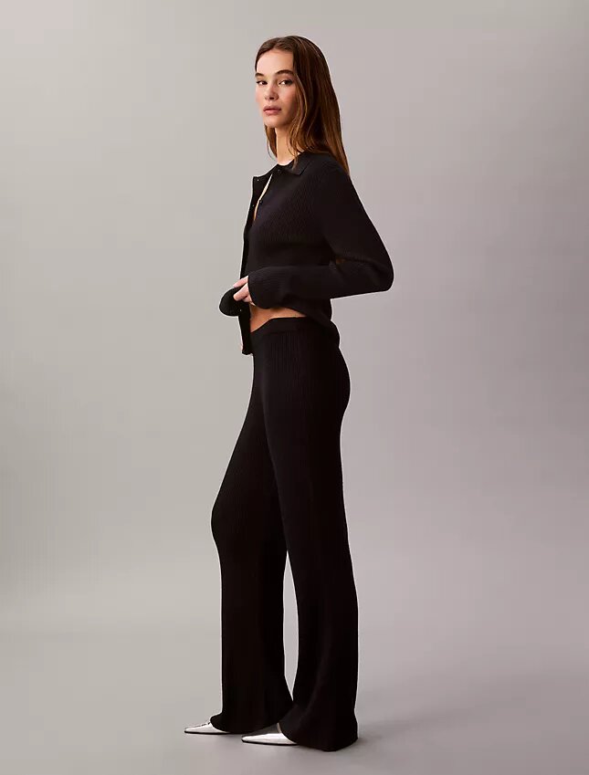 Pantaloni a zampa in misto lana merino e lurex Pantaloni a zampa in misto lana merino e lurex