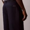 Pantaloni chino a vita media con pinces