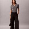 Pantaloni chino cropped a gamba larga