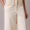 Pantaloni chino cropped a gamba larga Pantaloni chino cropped a gamba larga