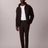 Pantaloni con cintura intrecciata e logo sportivo moderno