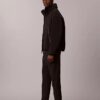 Pantaloni con cintura intrecciata e logo sportivo moderno