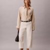 Pantaloni cropped a zampa