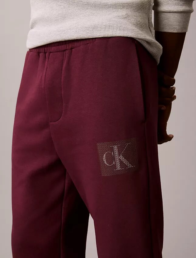 Pantaloni della tuta in felpa con grafica Monogram a strati Pantaloni della tuta in felpa con grafica Monogram a strati