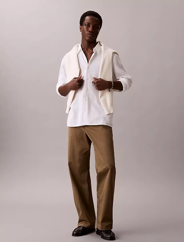 Pantaloni larghi in cotone elasticizzato Pantaloni larghi in cotone elasticizzato