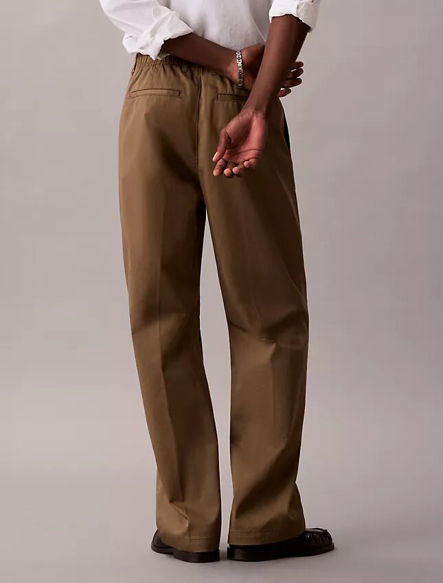 Pantaloni larghi in cotone elasticizzato Pantaloni larghi in cotone elasticizzato