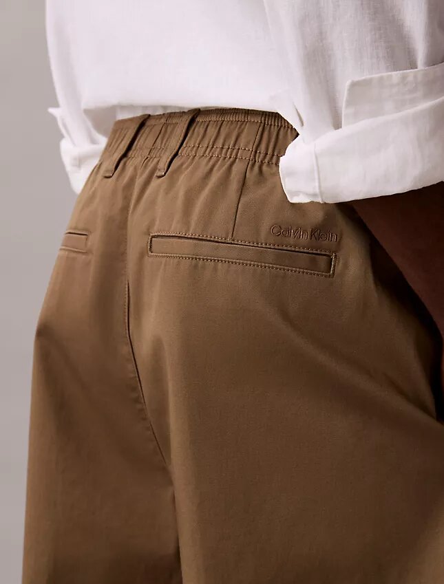 Pantaloni larghi in cotone elasticizzato Pantaloni larghi in cotone elasticizzato