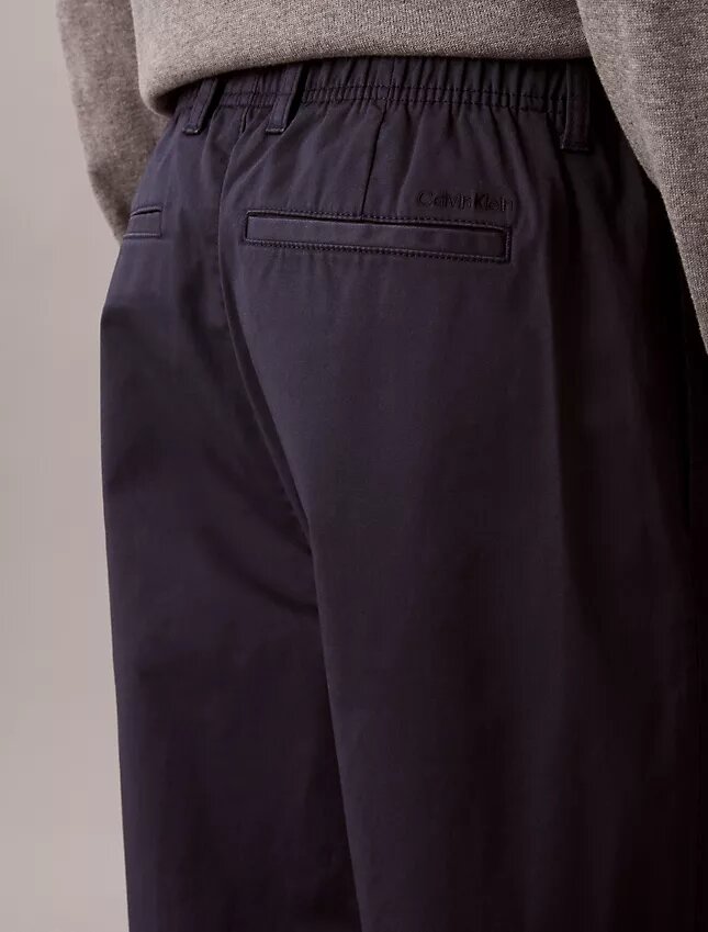 Pantaloni larghi in cotone elasticizzato Pantaloni larghi in cotone elasticizzato