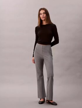 Pantaloni slim svasati in ponte