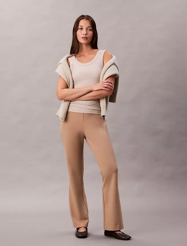 Pantaloni slim svasati in ponte Pantaloni slim svasati in ponte