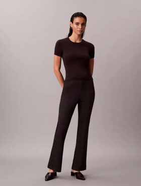 Pantaloni slim svasati in ponte