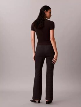 Pantaloni slim svasati in ponte