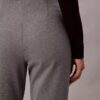 Pantaloni slim svasati in ponte Pantaloni slim svasati in ponte