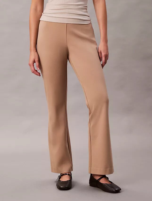 Pantaloni slim svasati in ponte Pantaloni slim svasati in ponte