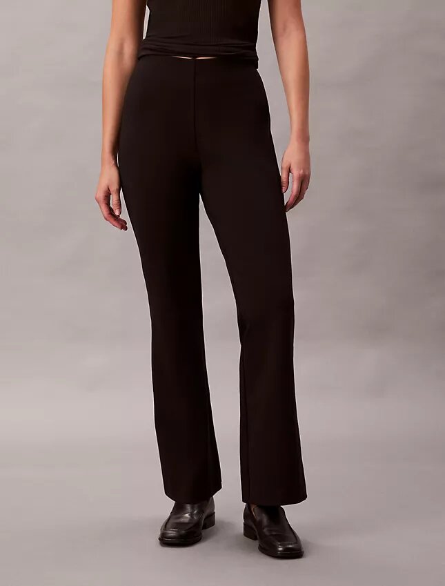 Pantaloni slim svasati in ponte Pantaloni slim svasati in ponte