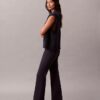 Pantaloni slim svasati in ponte Pantaloni slim svasati in ponte