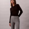 Pantaloni slim svasati in ponte Pantaloni slim svasati in ponte